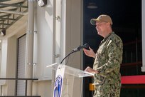 NAVAL SUPPORT ACTIVITY SOUDA BAY, Greece (April 3, 2025) Capt. Stephen Steacy, commanding officer, Naval Support Activity (NSA) Souda Bay, speaks during a ribbon cutting ceremony for the P144 Marathi Logistics Support Center at the NATO Marathi Pier Complex, Souda Bay, Greece, on April 3, 2025. NSA Souda Bay is an operational ashore installation that enables and supports U.S., Allied, Coalition, and partner nation forces to preserve security and stability in the European, African, and Central Command areas of responsibility. (U.S. Navy photo by Mass Communication Specialist 2nd Class Andrew Eder)