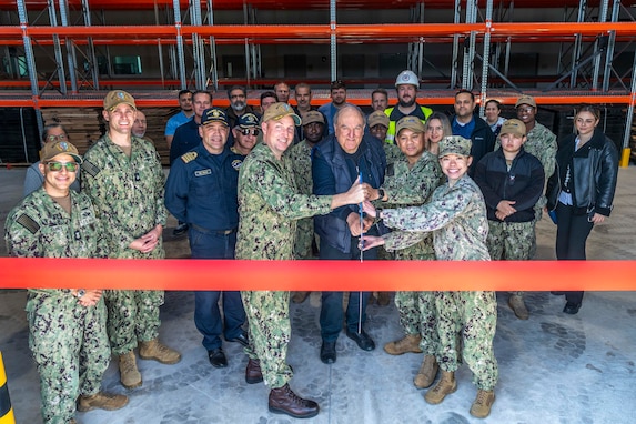 NAVAL SUPPORT ACTIVITY SOUDA BAY, Greece (April 3, 2025) Personnel assigned to Naval Facilities Engineering Systems Command, Navy Region Europe, Africa, Central, Public Works Department; Naval Support Activity (NSA) Souda Bay; and Naval Supply Systems Command Fleet Logistics Center Sigonella, Site Souda Bay, participate in a ribbon cutting ceremony for the P144 Marathi Logistics Support Center at the NATO Marathi Pier Complex, Souda Bay, Greece, on April 3, 2025. NSA Souda Bay is an operational ashore installation that enables and supports U.S., Allied, Coalition, and partner nation forces to preserve security and stability in the European, African, and Central Command areas of responsibility. (U.S. Navy photo by Mass Communication Specialist 2nd Class Andrew Eder)
