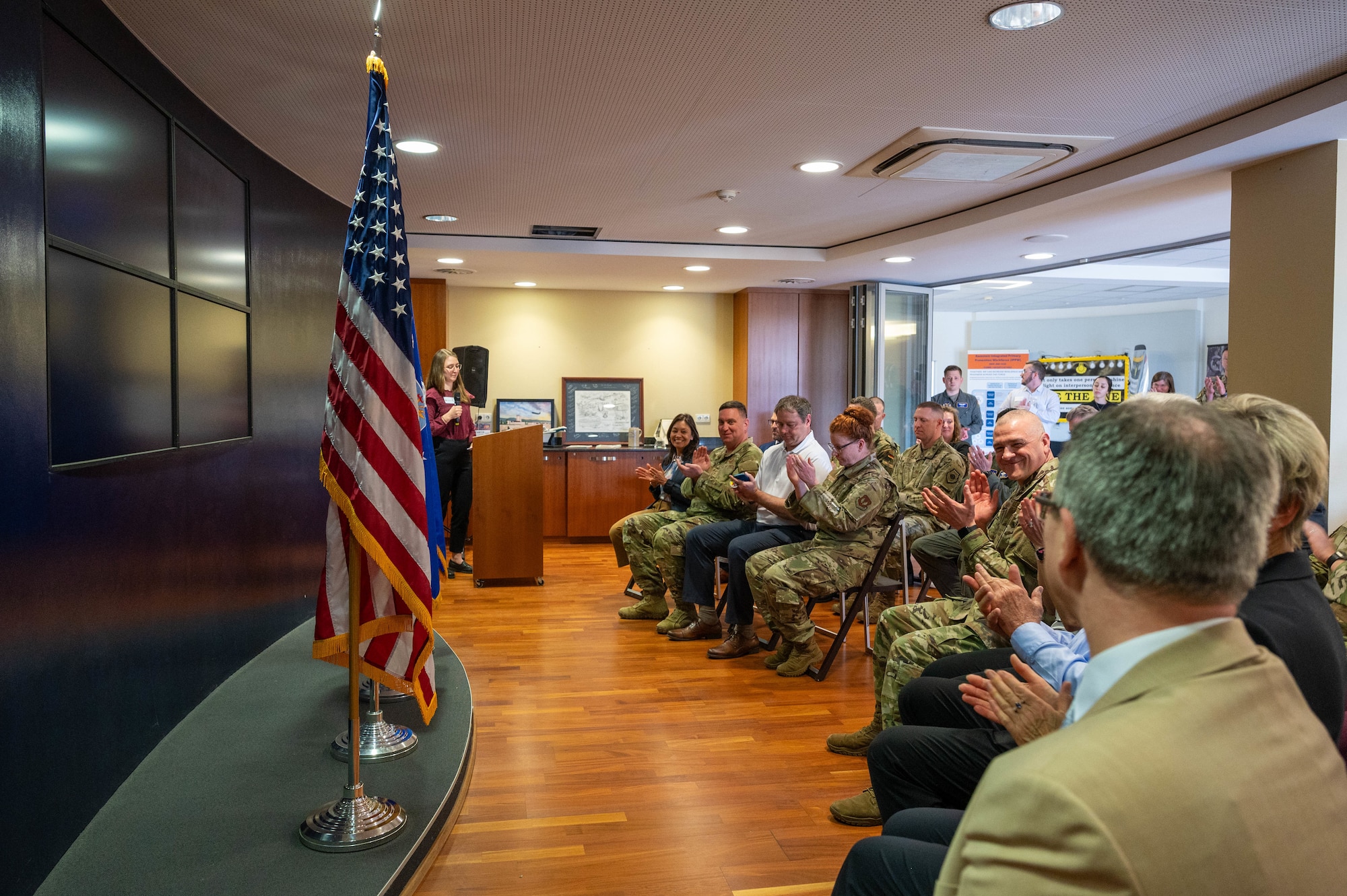 The 86th Airlift Wing leadership team and local civic leaders in the Kaiserslautern Military Community gather for the 86th AW Honorary Commander Ceremony on Ramstein Air Base, Germany, April. 8, 2025. The wing's honorary commanders program pairs local military leaders with civic leaders to foster lasting partnerships and promote meaningful knowledge exchange between the base and the surrounding community.