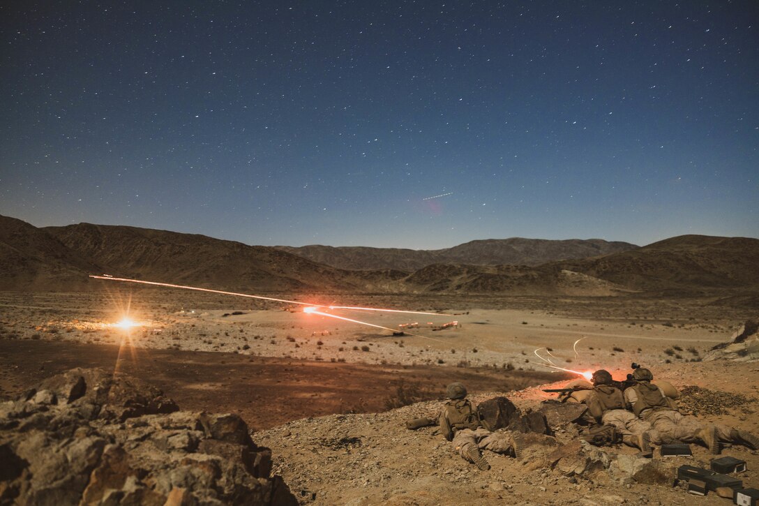 U.S. Marines with 1st Battalion, 6th Marine Regiment, 2d Marine Division, conduct a live-fire platoon attack during Service Level Training Exercise 2-25, at Marine Corps Air-Ground Combat Center, Twentynine Palms, California, April 4, 2025. SLTE 2-25 is designed to enhance lethality and prepare units to fight in any climate and place. (U.S. Marine Corps photo by Lance Cpl. Hunter J. Kuester)