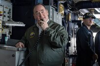 The Secretary of the Navy, the Hon. John C. Phelan, gives a speech over the pilot house 1MC to the crew of the world’s largest aircraft carrier, USS Gerald R. Ford (CVN 78), April 11, 2025.