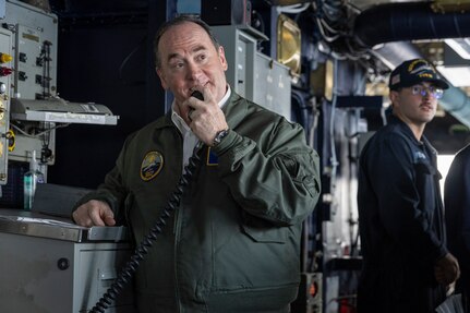 The Secretary of the Navy, the Hon. John C. Phelan, gives a speech over the pilot house 1MC to the crew of the world’s largest aircraft carrier, USS Gerald R. Ford (CVN 78), April 11, 2025.
