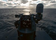 An MK 38 25mm machine gun system (MGS) waits to be cleared to fire during a live-fire gunnery exercise aboard the world's largest aircraft carrier, USS Gerald R. Ford (CVN 78), March 18, 2025.