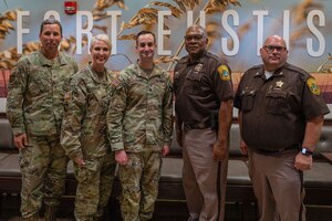 Leaders pose for a group photo.