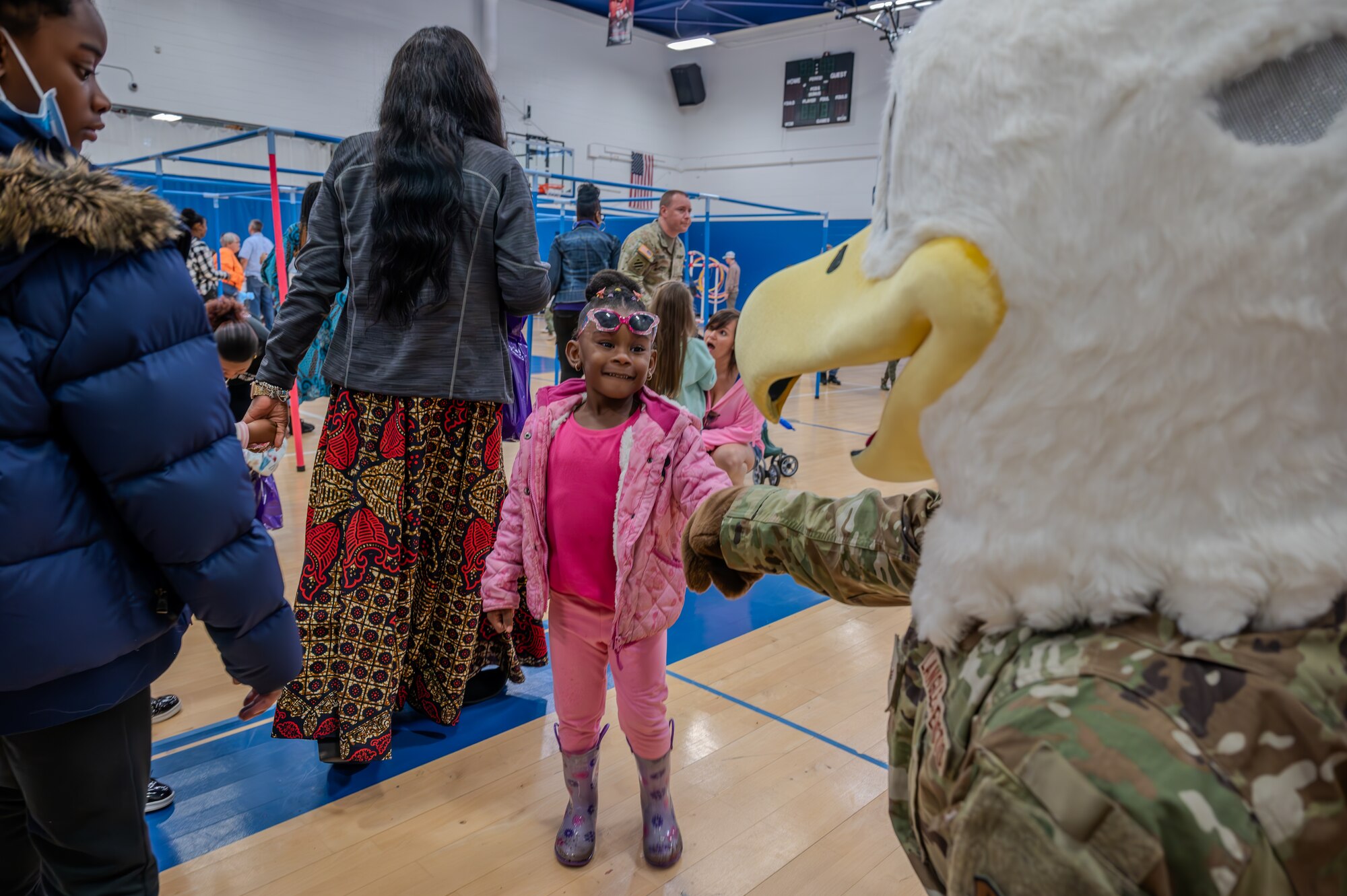 JB the Eagle, Joint Base Langley-Eustis’ mascot fist bumps a local child