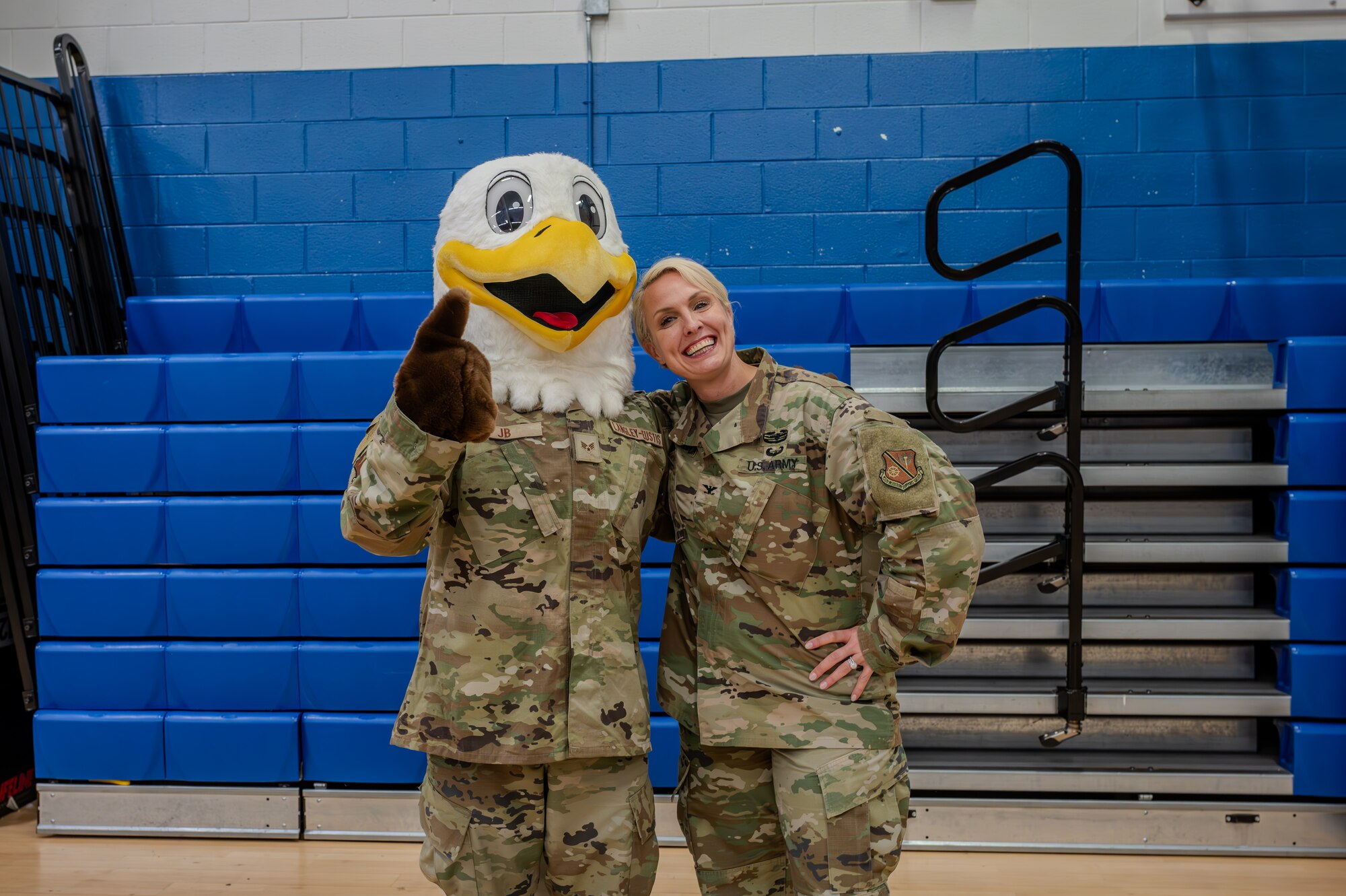 JB the Eagle, Joint Base Langley-Eustis’ mascot and Col. Laura Hutchinson pose for a photo