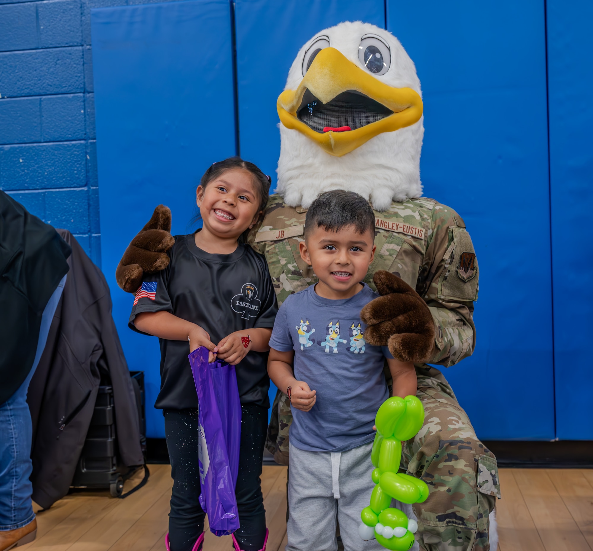 JB the Eagle, Joint Base Langley-Eustis’ mascot takes a photo with children