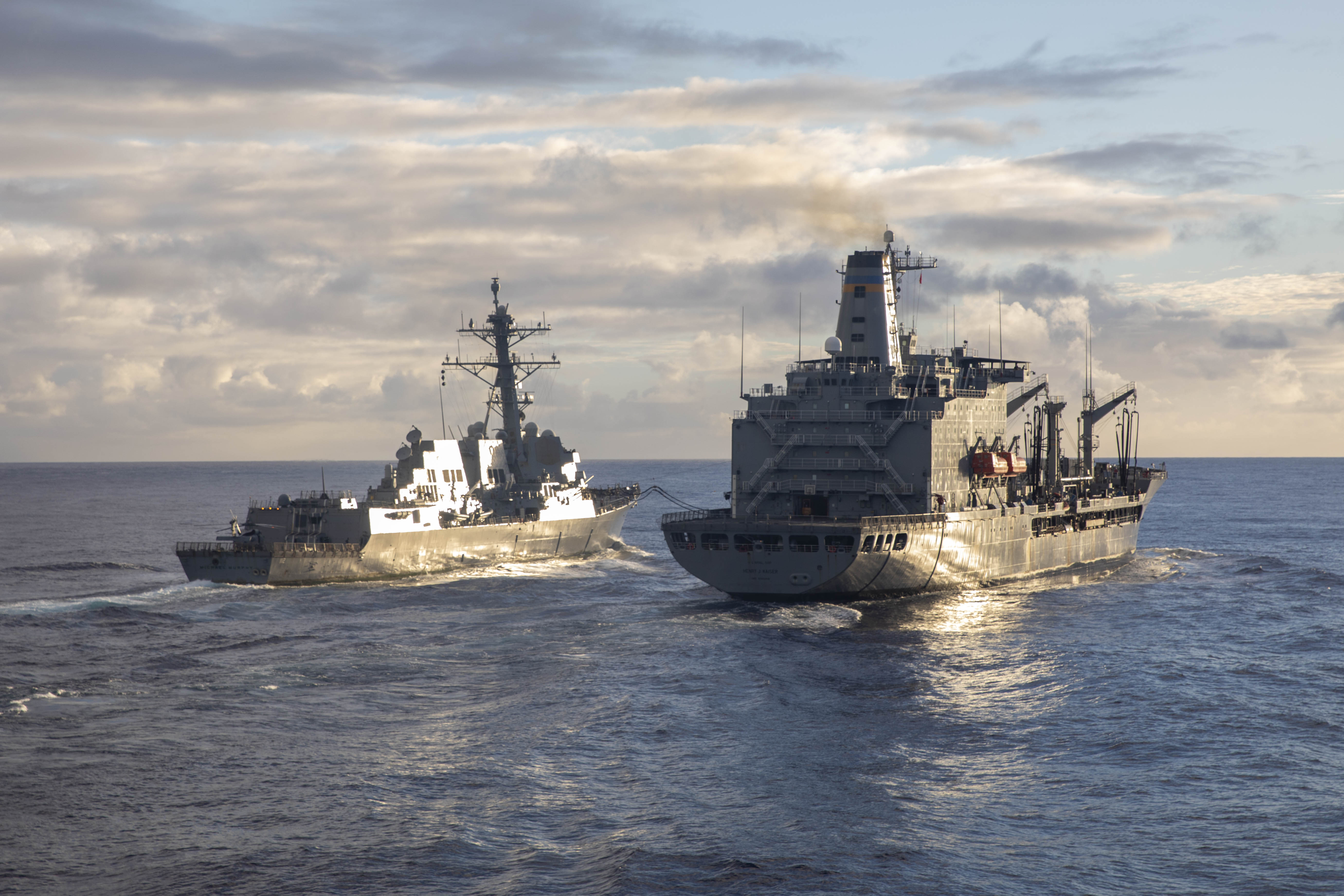 he Arleigh Burke-class guided-missile destroyer USS Michael Murphy (DDG 112) conducts a replenishment-at-sea with the Henry J. Kaiser-class fleet replenishment oiler USNS Henry J. Kaiser (T-AO 187).
