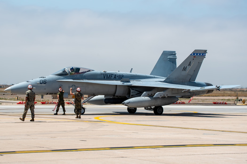 U.S. Marines with Marine Fighter Attack Squadron 112 (VMFA), Marine Aircraft Group 41, 4th Marine Aircraft Wing, Marine Forces Reserve, perform de-arming and hot break checks on an F/A-18A Super Hornet at Naval Air Station Joint Reserve Base Fort Worth, TX, June 7, 2024. VMFA-112 is part of the air combat element for Integrated Training Exercise 4-24. ITX provides the Marine Corps Reserve opportunities to conduct force deployment planning, mobilization rehearsals, and increase combat readiness for all elements of the Marine Air-Ground Task Force. (U.S. Marine Corps photo by Staff Sgt. Eric Kilpatrick)
