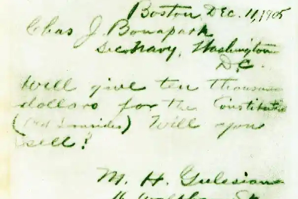 A closeup of a handwritten letter is shown from December 1905.