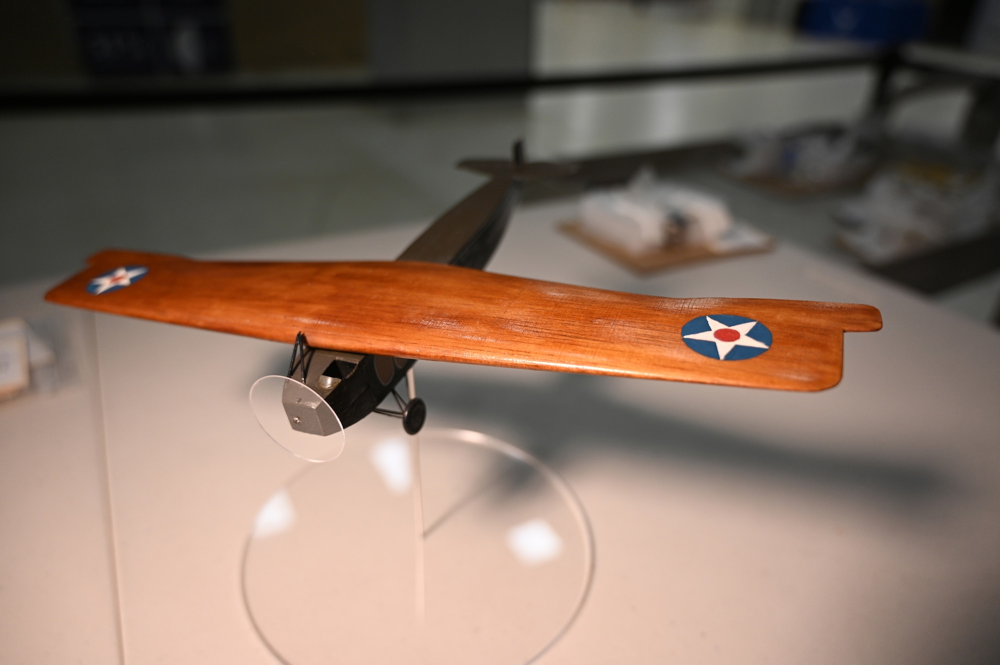 Aircraft model collection at the National Museum of the USAF with colorful balsa wood models ranging in scale from small to large.