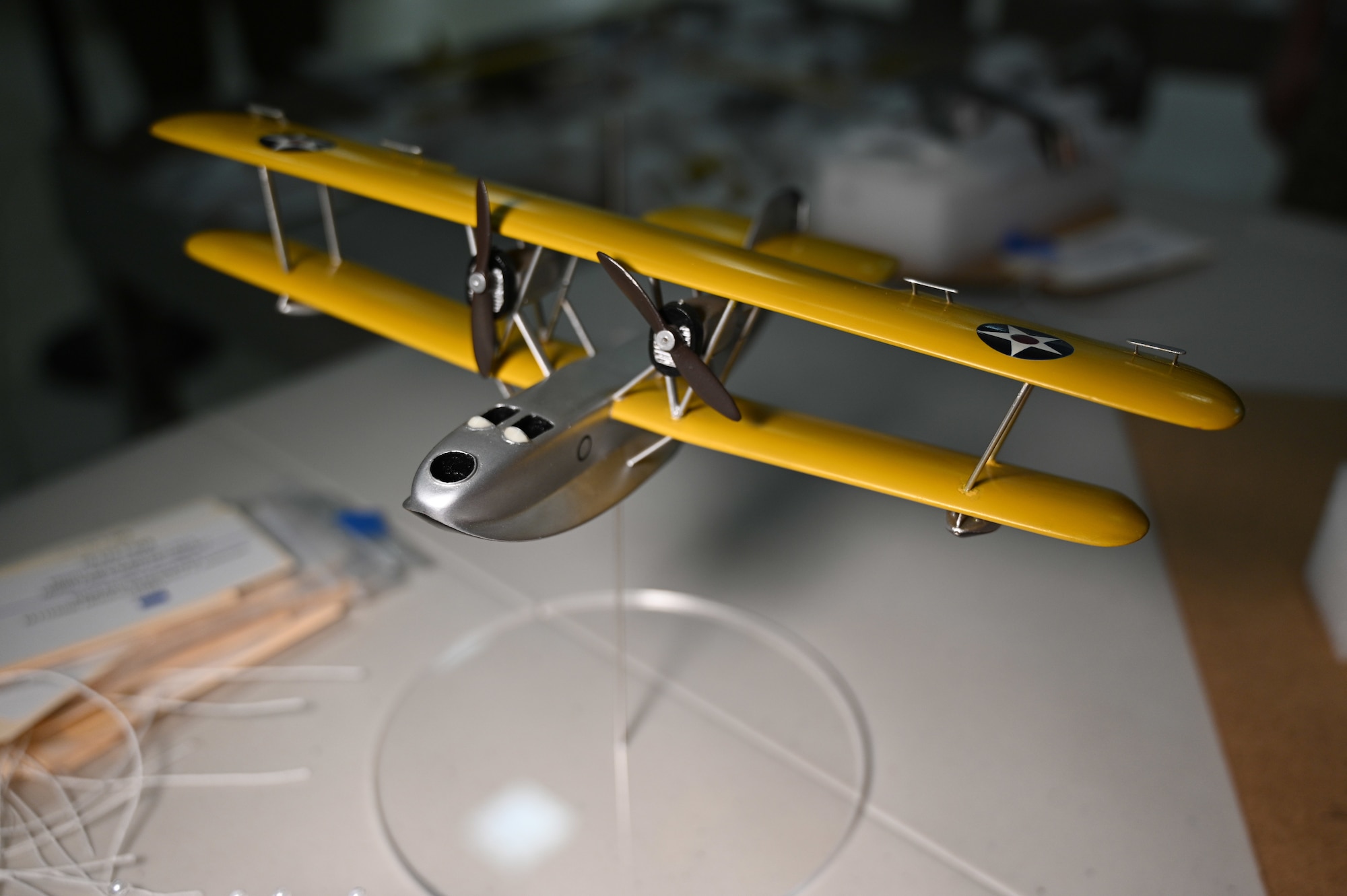 Aircraft model collection at the National Museum of the USAF with colorful balsa wood models ranging in scale from small to large.
