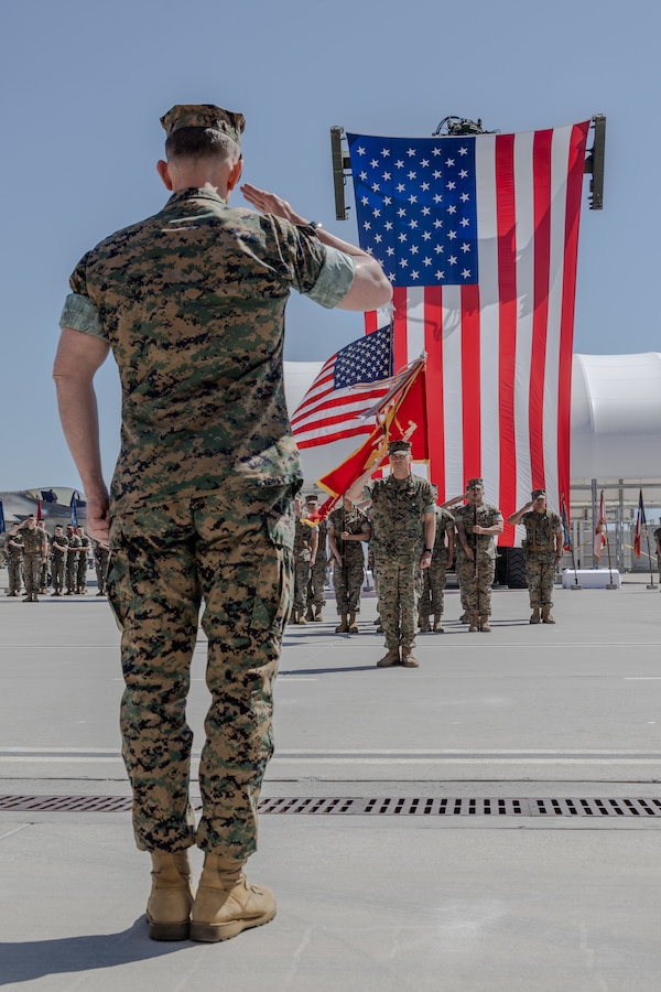 U.S. Marine Corps Lt. Col. Jeffrey C. Davis, the outgoing commanding officer of Marine Fighter Attack Squadron (VMFA) 314, Marine Aircraft Group 11, 3rd Marine Aircraft Wing, salutes Col. William J. Mitchell, the commanding officer of MAG-11, during a change of command ceremony at Marine Corps Air Station Miramar, California, March 21, 2025. The change of command ceremony signifies the transition to new leadership and a continuation of the unit’s constant preparedness to fight and win. (U.S. Marine Corps photo by Lance Cpl. Jennifer Sanchez)