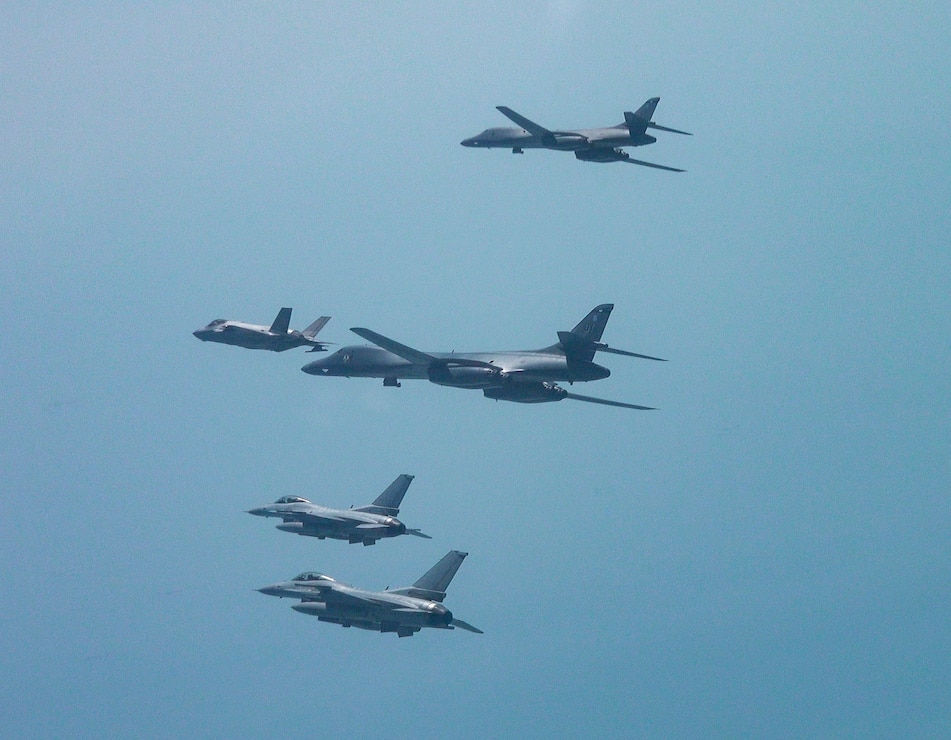 Two U.S. Air Force B-1 Lancers fly in formation with two U.S. F-16 Fighting Falcons and two Republic of Korea Air Force F-35A Lightning IIs in airspace over the western region of ROK, April 16, 2025.