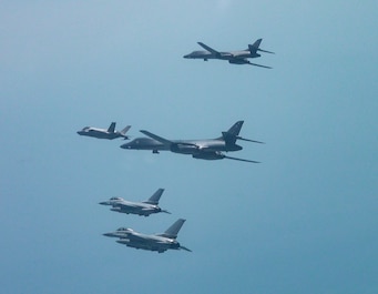 OSAN AIR BASE, GYEONGGIDO [KYONGGI-DO], South Korea (April 15, 2025) — Two U.S. Air Force B-1 Lancers fly in formation with two U.S. F-16 Fighting Falcons and two Republic of Korea Air Force F-35A Lightning IIs in airspace over the western region of...