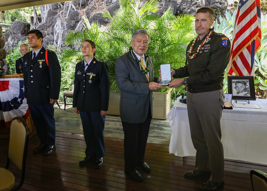 U.S. Army Pacific Deputy Commanding General Lt. Gen. Joel Vowell presents the Congressional Medal of Honor to Dr. Robert M. Wai during a Congressional Medal of Honor ceremony on April 14, 2025.