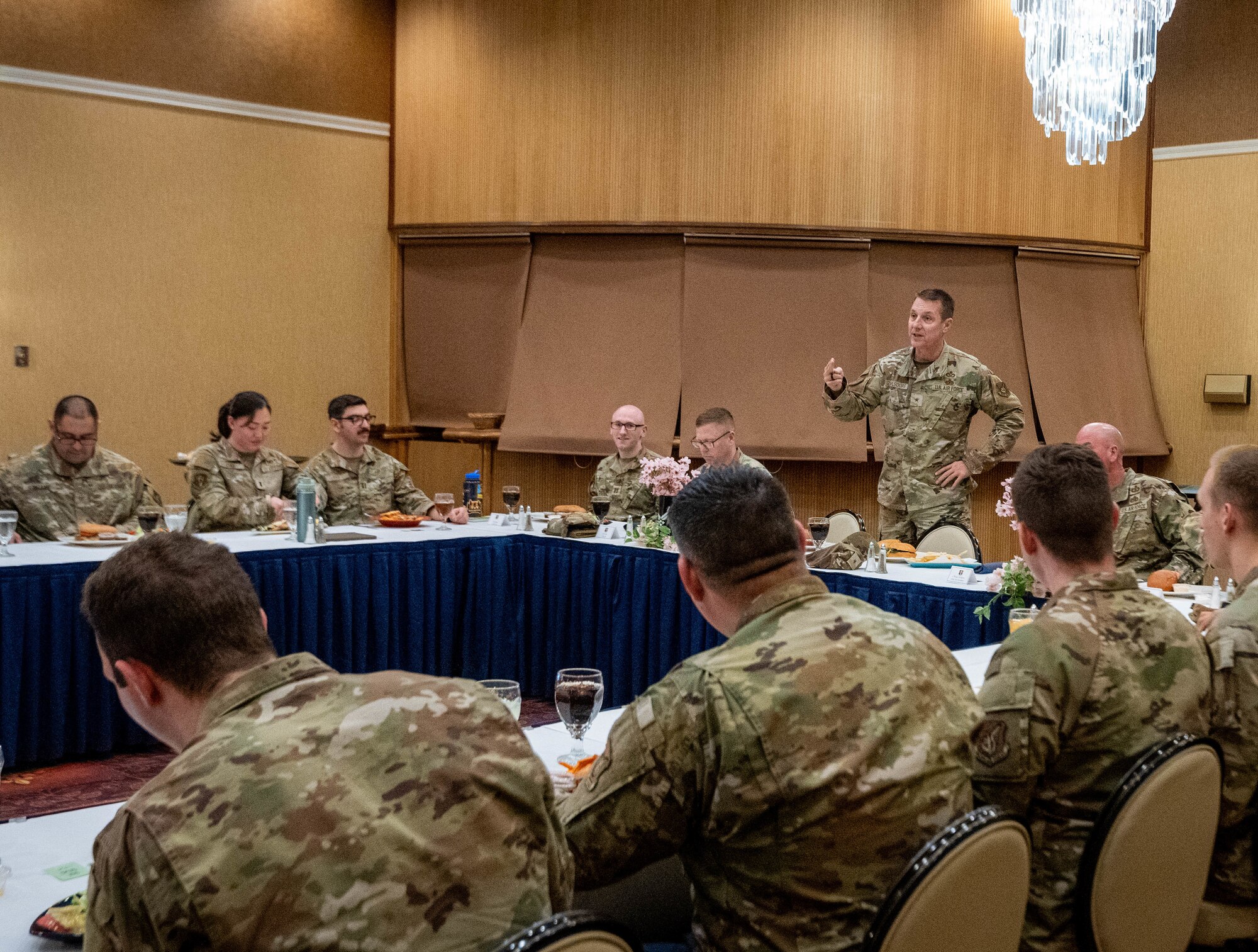 U.S. Air Force Brig. Gen. Michael Zuhlsdorf, Headquarters Pacific Air Forces director of logistics, engineering and force protection, addresses questions from company grade officers and senior non-commissioned officers under A4 during a luncheon at Misawa Air Base, Japan, April 9, 2025.