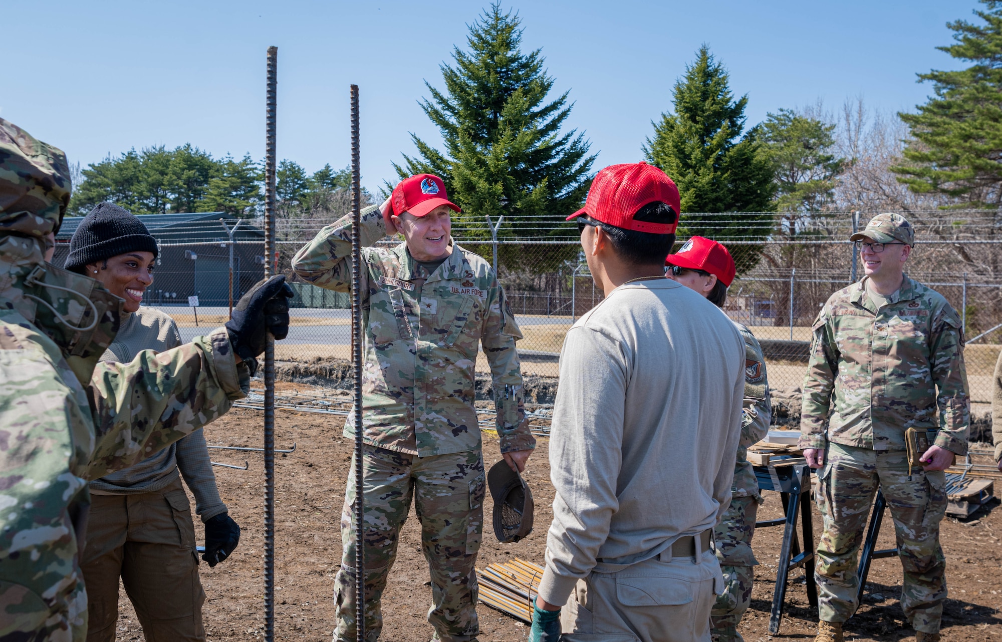 U.S. Air Force Brig. Gen. Michael Zuhlsdorf, Headquarters Pacific Air Forces director of logistics, engineering and force protection, wears a red ball cap during a site tour at Misawa Air Base, Japan, April 9, 2025.