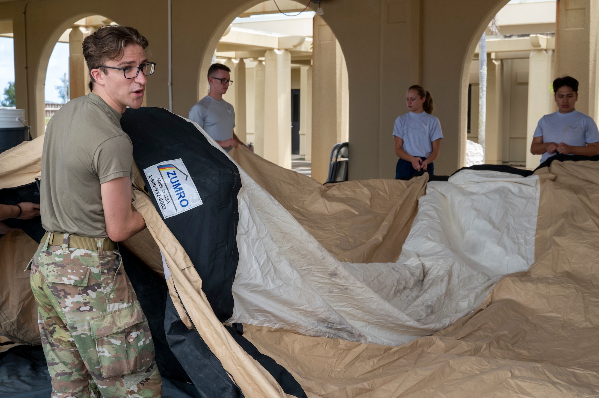 36th Medical Group Airmen set up a triage tent during a Home Station Medical Response training event, Andersen Air Force Base, Guam, April 2, 2025. MDG hosts these types of trainings each month to increase readiness for any man-made or real-world disasters. (U.S. Air Force Photo by Airman Xavier Romero)