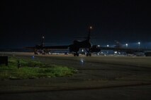 Two B-1B Lancers assigned to the 9th Bomb Squadron taxi on the flightline before takeoff to  support a Bomber Task Force at LOCATION at Dyess Air Force Base, Texas, Apr. 14, 2025 .  BTF deployments like this enhance the readiness and training necessary to respond to any potential crisis or challenge across the globe.