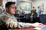 Tech. Sgt. Erik Garduno, 318th Training Squadron, operates the simulator in the Aircraft Maintenance Officer Course lab. The squadron recently acquired new and upgraded software and equipment that leaders say significantly improves its functionality and accuracy. The acquisition was a result of a collaborative effort between the Inter-American Air Forces Academy and the Air Mobility Command which enabled the Expeditionary Operations School to share its resources. (U.S. Air Force photo by Vanessa R. Adame)