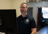 Capt. (Ret.) M. Alaric Franzos, MD, MPH, FACC, FACP, a staff cardiologist at Walter Reed National Military Medical Center, reviews trainee screening data as part of the Electrocardiogram Risk Assessment to reduce Sudden cardiac Events (ERASE) program at Joint Base San Antonio-Lackland, Texas, March 22, 2025.