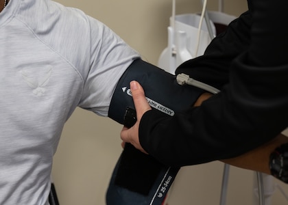 A medical technician takes a basic trainee’s blood pressure during an ERASE cardiac screening at Joint Base San Antonio-Lackland, Texas, March 22, 2025.