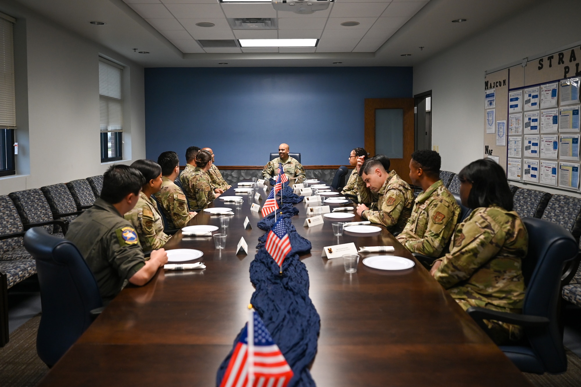 Chief Nuñez sits with Airmen