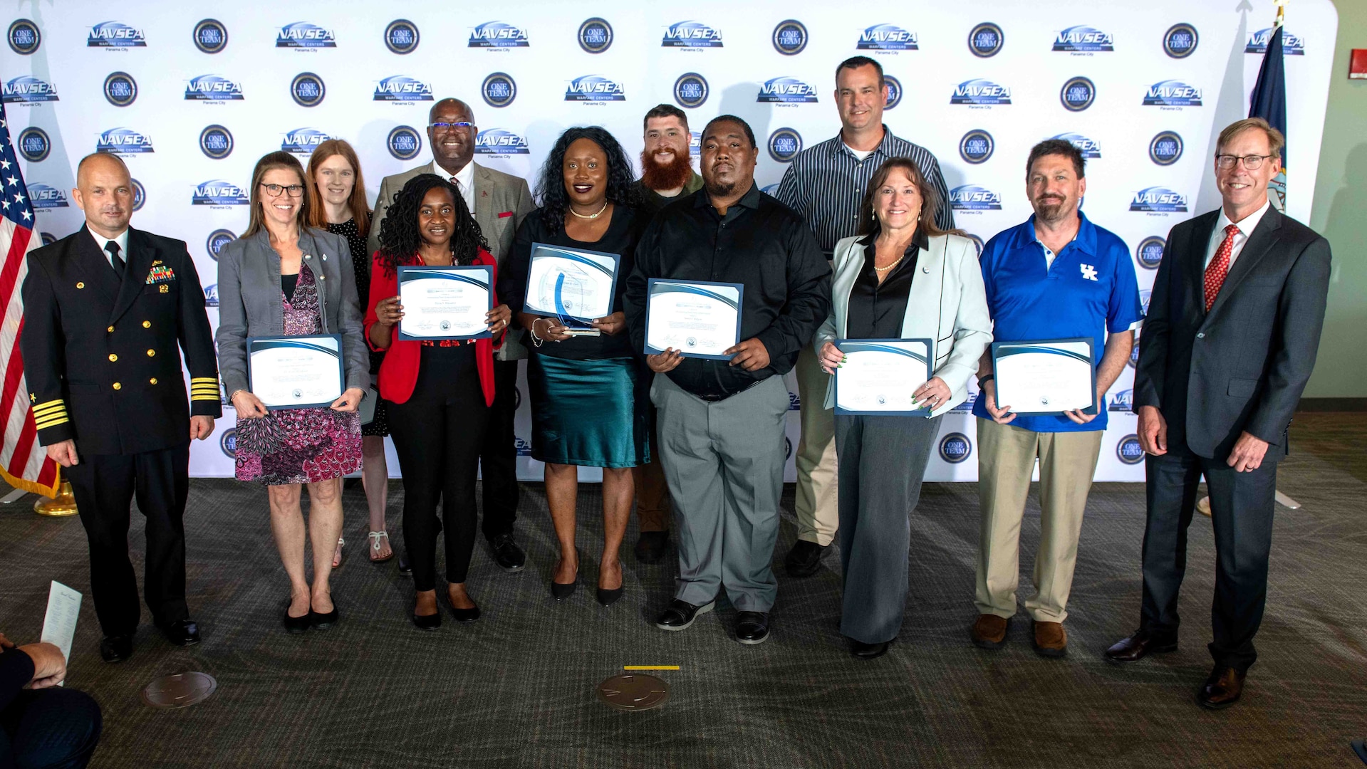 FY24 NSWC PCD Outstanding Team Achievement Annual Award: Electronic Procurement Systems Implementation Team – Tyler Bounds, Tommy Chatman, Jessica Clark, Rob Griffith, Andrew Johns, Dr. Jessica Johnson, Jamell Kilgore, Trivia Massaline, Nicole Stevens, Kaitlin Summerville, and Jason Zimmerman. This team volunteered to be NAVSEA’s early adopter of the new contract writing system - EPS - which is an integral part of supporting NAVSEA’s Campaign to “Transform Digital Capability.” (U.S. Navy photo by Eddie Green)