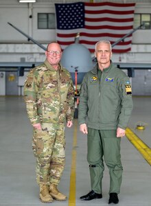 United States Air Force Maj. Gen. Michael Bank, the commander of the New York Air National Guard and Swedish air force Maj. Gen. Jonas Wikman, chief of the Swedish air force, pose for a photo during a visit to Hancock Field Air National Guard Base in Syracuse, NY, Apr. 7.