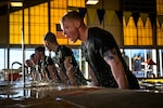 U.S. Marines assigned to Marine Aircraft Group 49 perform water-based exercises while training under the Marine Corps Martial Arts Program at Joint Base McGuire-Dix-Lakehurst, N.J.