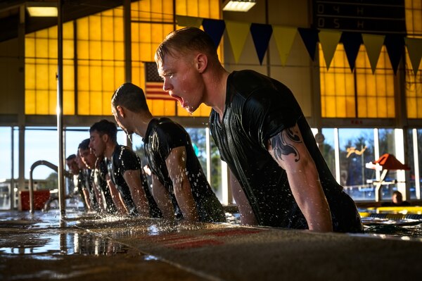 U.S. Marines assigned to Marine Aircraft Group 49 perform water-based exercises while training under the Marine Corps Martial Arts Program at Joint Base McGuire-Dix-Lakehurst, N.J., Jan. 10, 2025. MCMAP is a combat system that combines existing and new hand-to-hand and close quarters combat techniques with morale, team-building functions and instruction in the warrior ethos. The techniques used by MCMAP vary in degrees of lethality allowing members to qualify and master up to six disciplines through continuation in the program. (U.S. Air Force photo by Senior Airman Matt Porter)