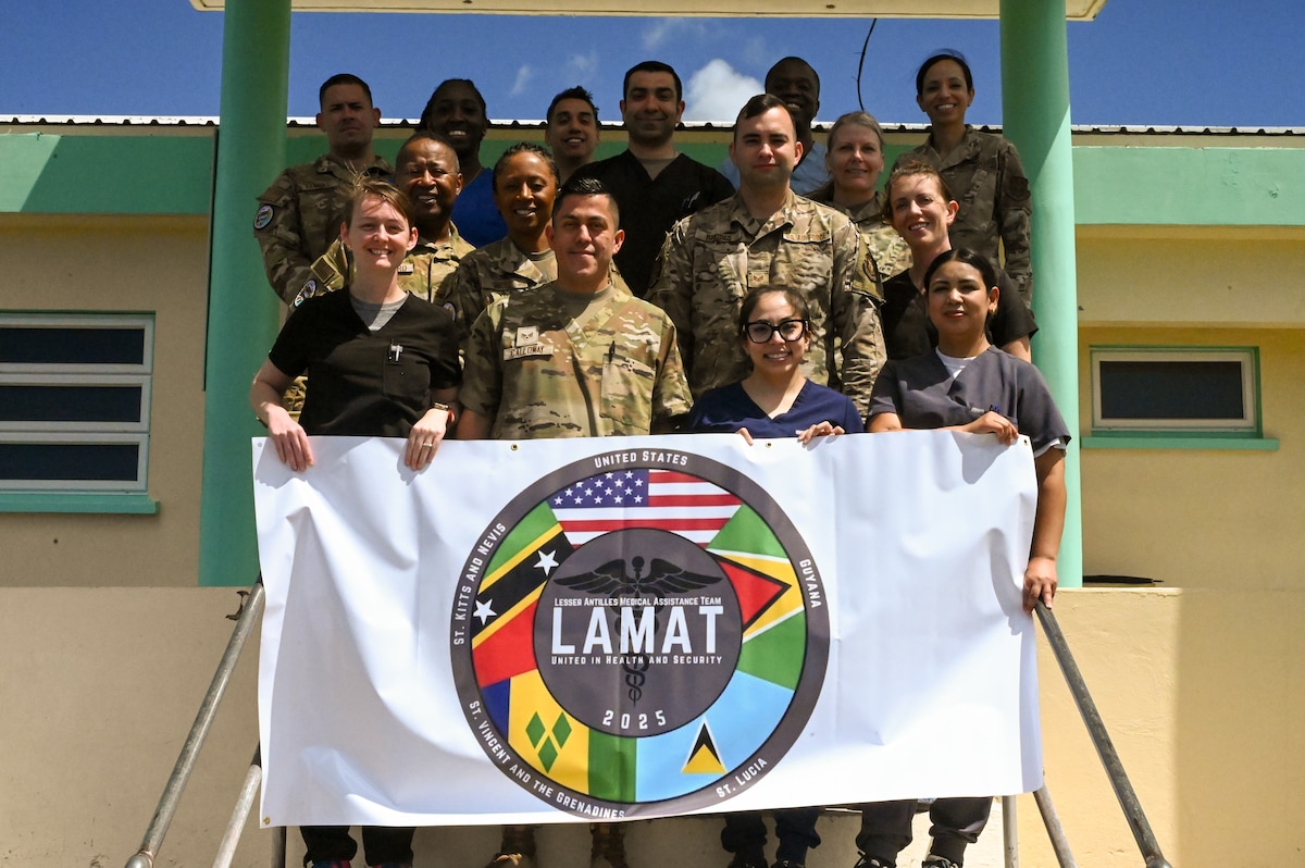 U.S. Air Force medical personnel pose for a group photo outside Alexandria Hospital in Charlestown, St. Kitts and Nevis, March 26, 2025.