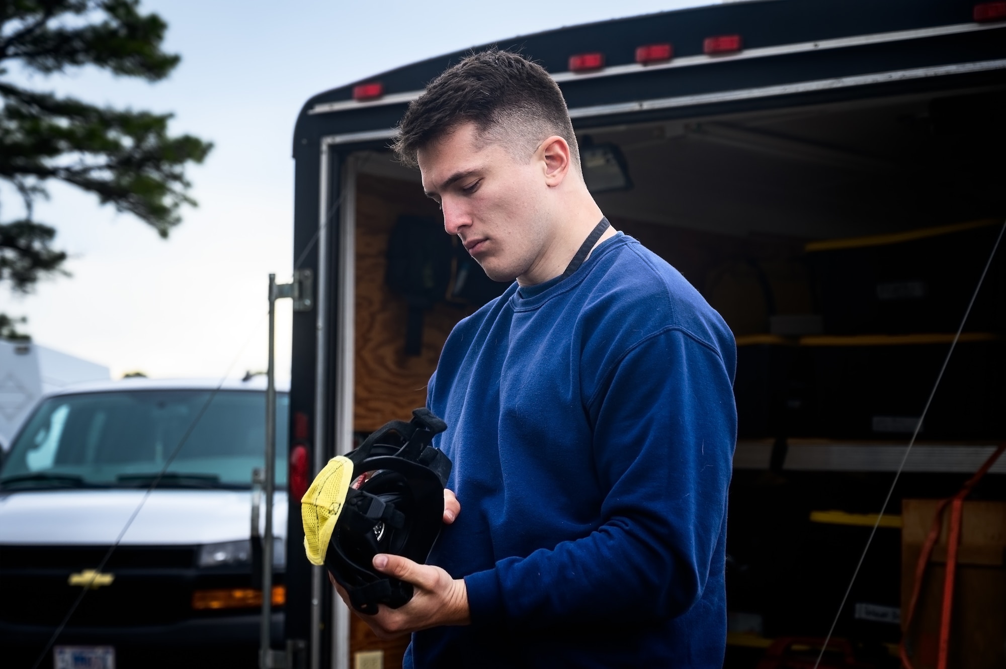 Collin Rich, recitation response escort with the U.S. Army’s 20th Chemical, Biological, Radiological, Nuclear, Explosives (CBRNE) Analytical and Remediation Activity (CARA), performs a quality assurance check on a respirator mask at Joint Base McGuire-Dix-Lakehurst, N.J., April 14, 2025. The CARA recitation response team was tasked to remove an unexploded MK II 75mm projectile with potential chemical components that was discovered at JB MDL. (U.S. Air Force photo by Senior Airman Matt Porter)