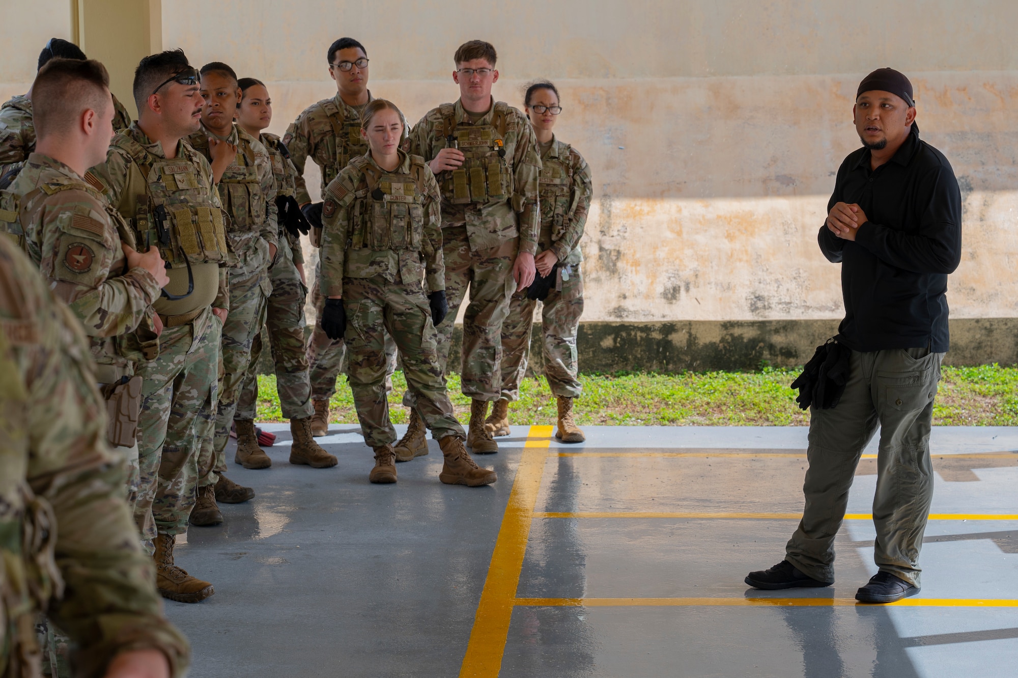 A U.S. Air Force 36th Security Forces Squadron team member takes cover during training at Andersen Air Force Base, Guam, April 15, 2025. The training was held to hone communication and combat arms skills. (U.S. Air Force photo by Airman 1st Class Joseph Maye)