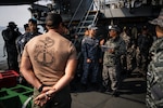 JINHAE NAVAL BASE, Republic of Korea (April 10, 2025) U.S. Navy Divers, assigned to Mobile Diving and Salvage Unit 1, receive a dive briefing from Republic of Korea navy divers aboard the diving tender ROKS Guang Yang (YDT-805) during a joint dive and salvage exercise in the harbor of Jinhae Naval Base, Republic of Korea, April 10, 2025. Commander, Logistics Group Western Pacific/Task Force 73 sustains the U.S. Navy’s maritime forces and is responsible for all diving and salvage operations in the Western Pacific in support of a free and open Indo-Pacific.