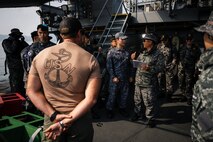 JINHAE NAVAL BASE, Republic of Korea (April 10, 2025) U.S. Navy Divers, assigned to Mobile Diving and Salvage Unit 1, receive a dive briefing from Republic of Korea navy divers aboard the diving tender ROKS Guang Yang (YDT-805) during a joint dive and salvage exercise in the harbor of Jinhae Naval Base, Republic of Korea, April 10, 2025. Commander, Logistics Group Western Pacific/Task Force 73 sustains the U.S. Navy’s maritime forces and is responsible for all diving and salvage operations in the Western Pacific in support of a free and open Indo-Pacific.