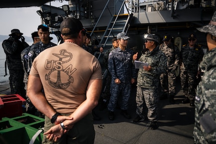 JINHAE NAVAL BASE, Republic of Korea (April 10, 2025) U.S. Navy Divers, assigned to Mobile Diving and Salvage Unit 1, receive a dive briefing from Republic of Korea navy divers aboard the diving tender ROKS Guang Yang (YDT-805) during a joint dive and salvage exercise in the harbor of Jinhae Naval Base, Republic of Korea, April 10, 2025. Commander, Logistics Group Western Pacific/Task Force 73 sustains the U.S. Navy’s maritime forces and is responsible for all diving and salvage operations in the Western Pacific in support of a free and open Indo-Pacific.