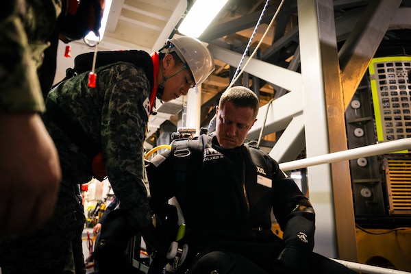 JINHAE NAVAL BASE, Republic of Korea (April 9, 2025) Chief Warrant Officer 2 Nick Blankshine, assigned to Mobile Diving and Salvage Unit 1, prepares for a 170-foot dive from the Tongyeong-class salvage and rescue ship ROKS Gwangyang (ATS-32), during a joint dive and salvage exercise in the harbor of Jinhae Naval Base, Republic of Korea, April 9, 2025. Commander, Logistics Group Western Pacific/Task Force 73 sustains the U.S. Navy’s maritime forces and is responsible for all diving and salvage operations in the Western Pacific in support of a free and open Indo-Pacific.