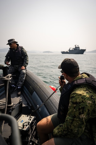 JINHAE NAVAL BASE, Republic of Korea (April 10, 2025) U.S. Navy Chief Warrant Officer 2 Nick Blankshine, assigned to Mobile Diving and Salvage Unit 1, communicates with submerged divers as they conduct an underwater search during a joint dive and salvage exercise in the harbor of Jinhae Naval Base, Republic of Korea, April 10, 2025. Commander, Logistics Group Western Pacific/Task Force 73 sustains the U.S. Navy’s maritime forces and is responsible for all diving and salvage operations in the Western Pacific in support of a free and open Indo-Pacific.