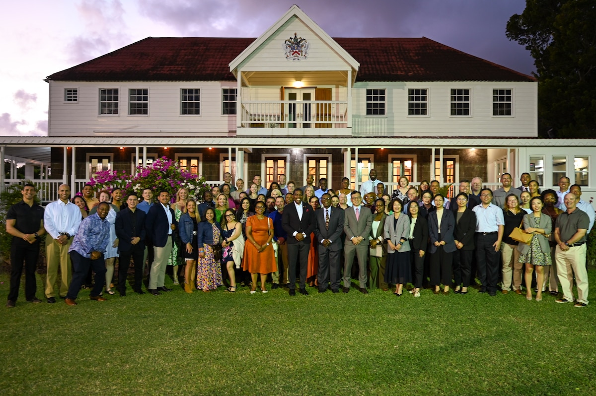 Members of the Lesser Antilles Medical Assistance Team (LAMAT) 2025 mission pose for a group photo with the Honorable Dr. Terrance M. Drew (center), the Prime Minister of St. Kitts and Nevis and Minister of Health, and other key Kittitian and Nevisian leaders at the Governor General’s official residence in Basseterre, St. Kitts and Nevis, April 2, 2025.
