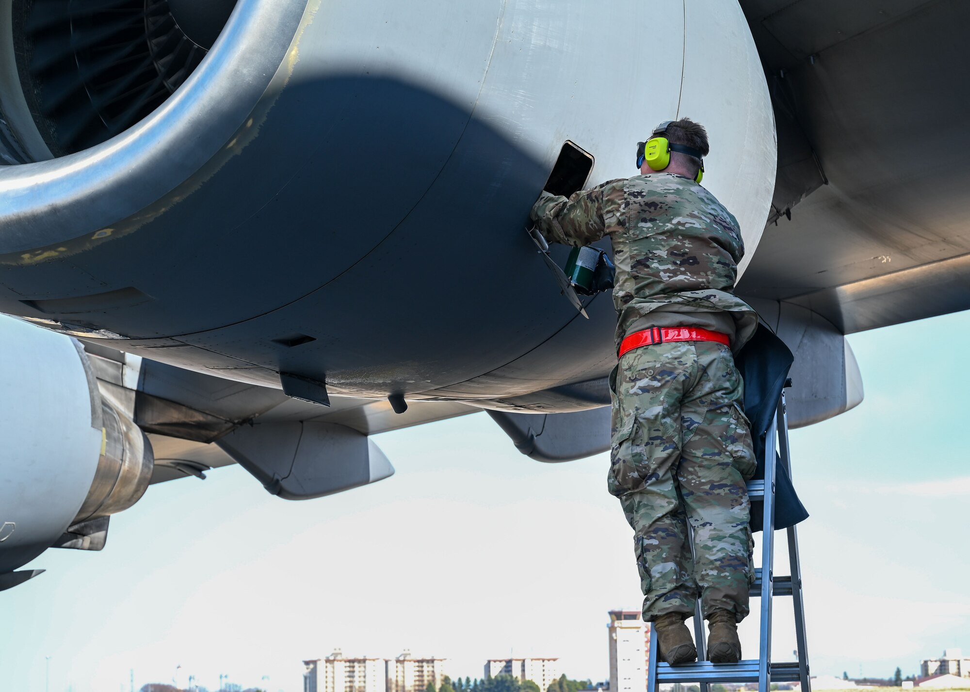 Crew chief works on aircraft