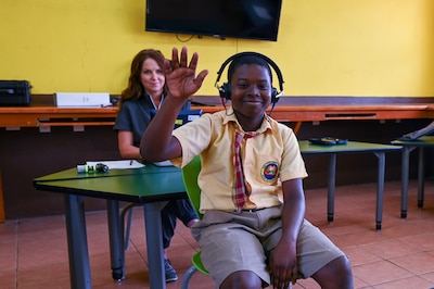 Dr. Heather Jensen (left), a Non-Government Organization (NGO) audiologist, conducts a hearing test on an 11-year-old Kittitian boy at the Halliday-Smith Primary School in Basseterre, St. Kitts and Nevis March 26, 2025.