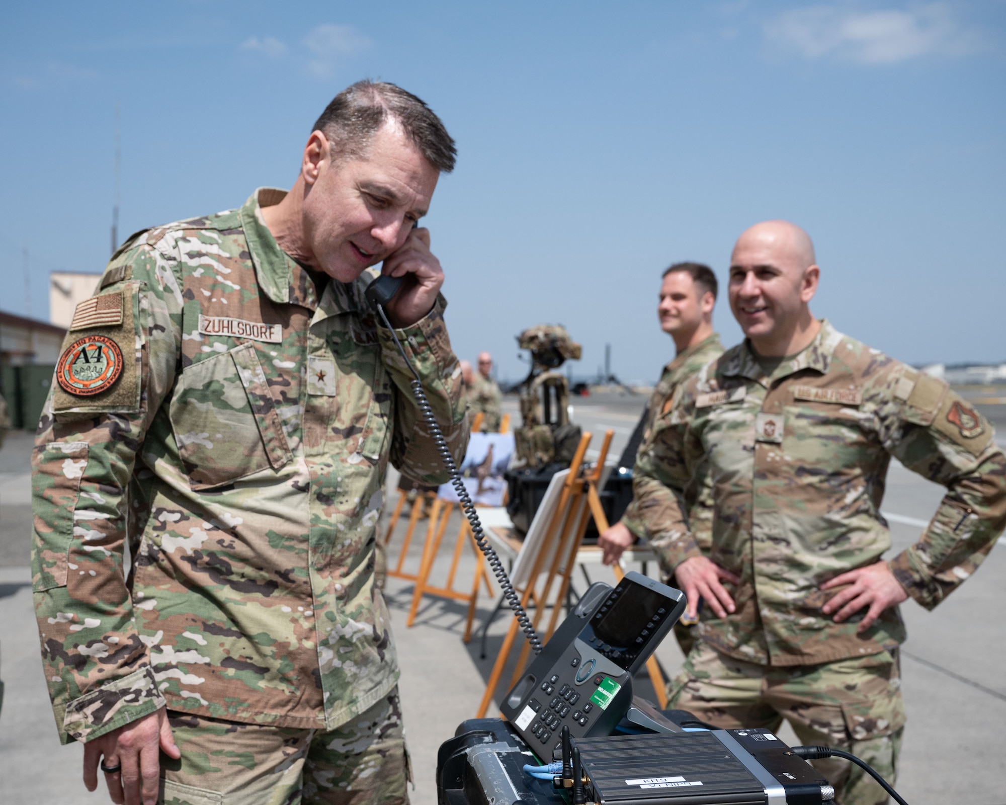 A service member speaks on the phone