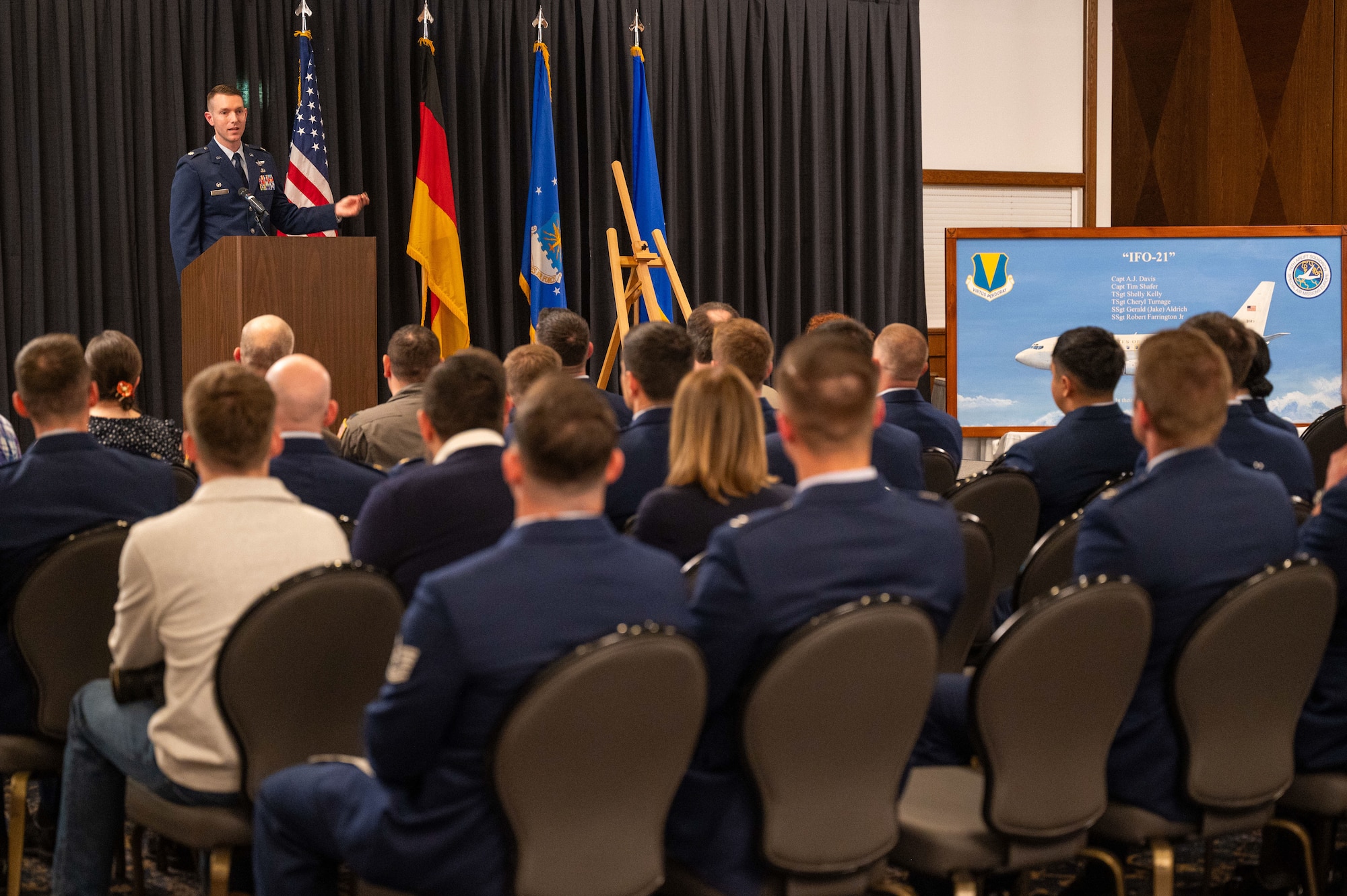 U.S. Air Force Lt. Col. Bryan Gibbs, 76th Airlift Squadron commander, gives a speech during a remembrance ceremony honoring the fallen crew of Implementation Force-21 at Ramstein Air Base, Germany, April 10, 2025. This event marked the 29th anniversary of the IFO-21 accident that occurred outside of Dubrovnik, Croatia during a diplomatic mission within the region.