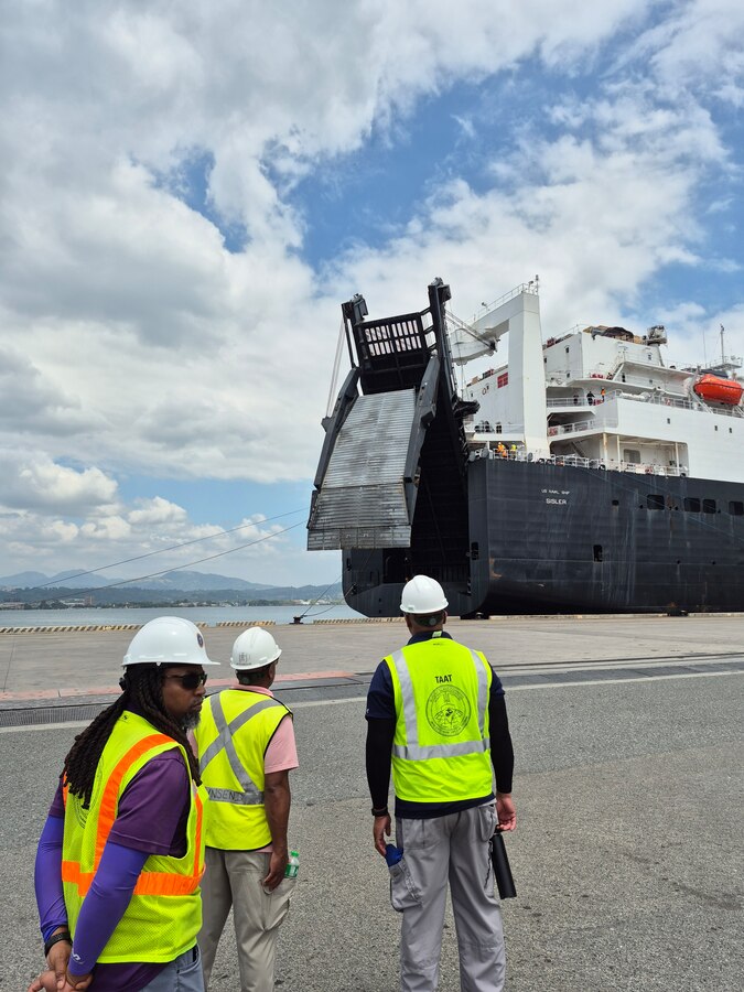 A technical advisory and assistance team from Blount Island Command approach the USNS Sisler, a cargo ship operated by Military Sealift Command, ahead of pier-side offloading March 24 at Subic Bay in the Philippines. Equipment, sent from Marine Corps Support Facility Blount Island in Jacksonville, Florida, the hub of Marine Corps’ prepositioning programs, will support Marines participating in Exercise Balikatan 25, which kicks off April 21. Balikatan is a longstanding annual exercise between the Philippines and U.S. armed forces. (Official U.S. Marine Corps photo/Maj. James Fazica)