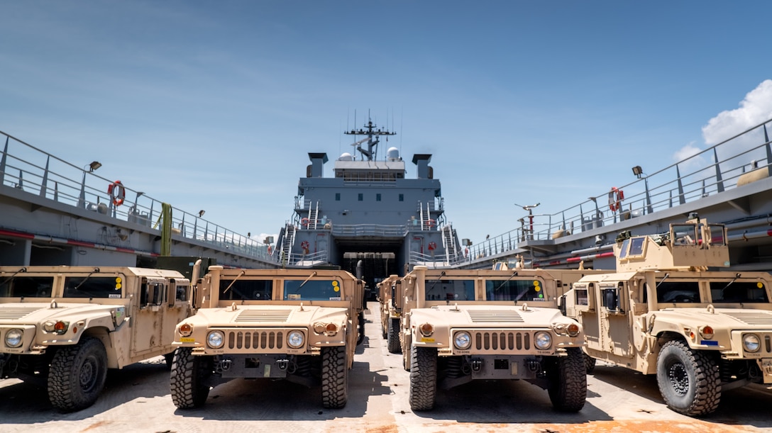 U.S. Army Reserve vessel Robert T. Kuroda (LSV-7) stages equipment to be transported to the shore during the combined joint over-the-shore operations in preparation for Exercise Balikatan 25 in Dingalan, Philippines, April 9, 2025. Balikatan is a longstanding annual exercise between the Armed Forces of the Philippines and U.S. military designed to strengthen our ironclad alliance, improve our capable combined force, and demonstrate our commitment to regional security and stability. (U.S. Marine Corps photo by Cpl. Brian Knowles)