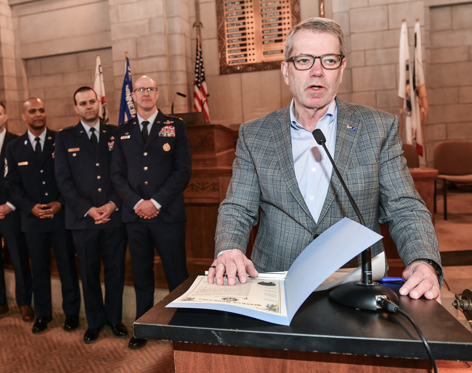 Nebraska governor Jim Pillen signs a proclamation declaring April the Month of the Military Child ini Lincoln, April 10, 2025. Former Secretary of Defense Caspar Weinberger established the tradition in 1986 to highlight the strength of the youngest members of the total force and to honor their sacrifices. (U.S. Air Force photo by Chad Watkins)