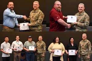 Men and women accepting an award certificate