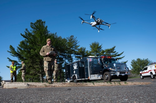 U.S. Air Force Staff Sergeant Derrick Downey, 87th Civil Engineer Squadron operations manager, pilots a drone to survey the water plant during Operation Honey Badger (OHB) at Joint Base McGuire-Dix-Lakehurst, N.J., April 8, 2025. OHB is an exercise organized by the 87th Civil Engineer Squadron to prepare Airmen for real-world situations and promote mission readiness. (U.S. Air Force photo by Airman 1st Class Luisa E. Dugan)